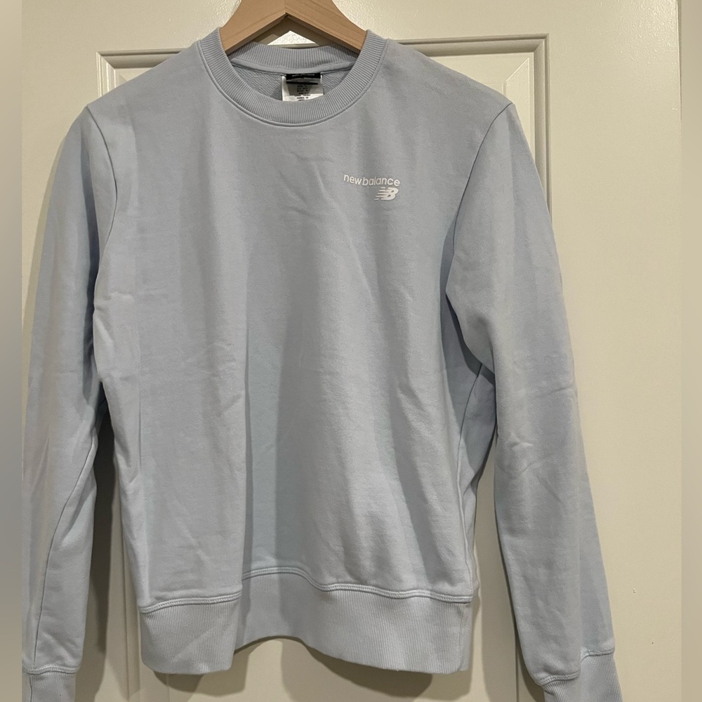 New Balance women’s Light Blue Sweater